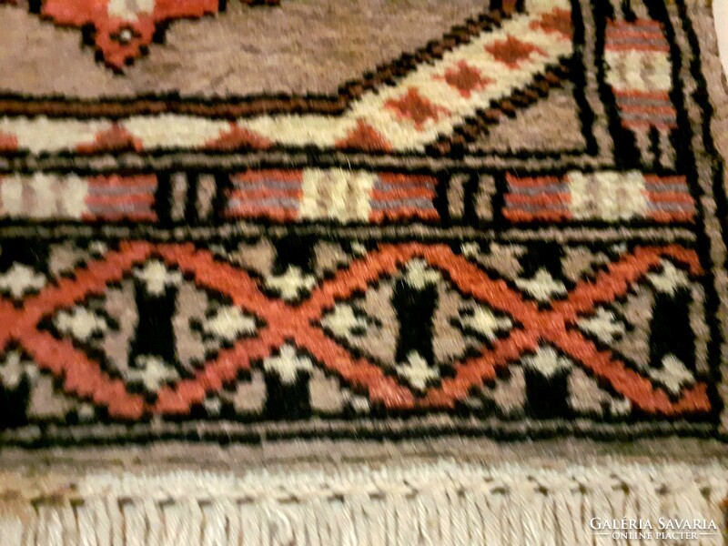 Handwoven small wool prayer rug in good condition