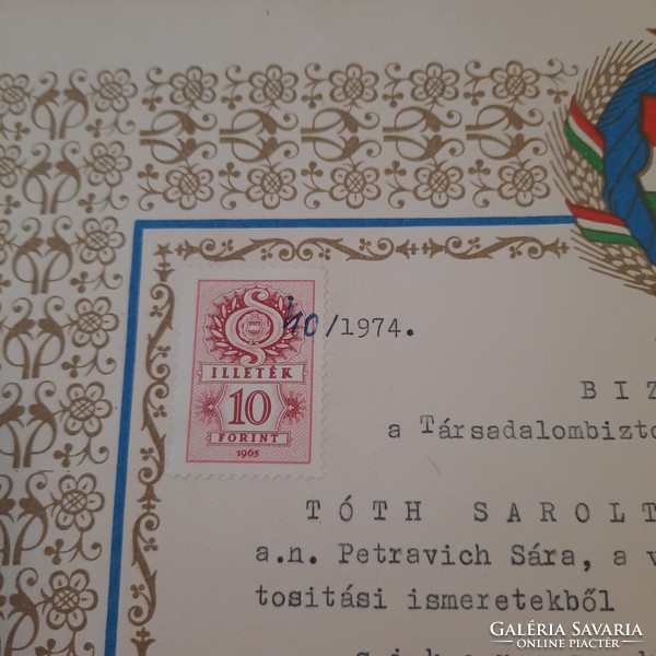 Certificate of successful completion of the social security secondary examination in 1974.