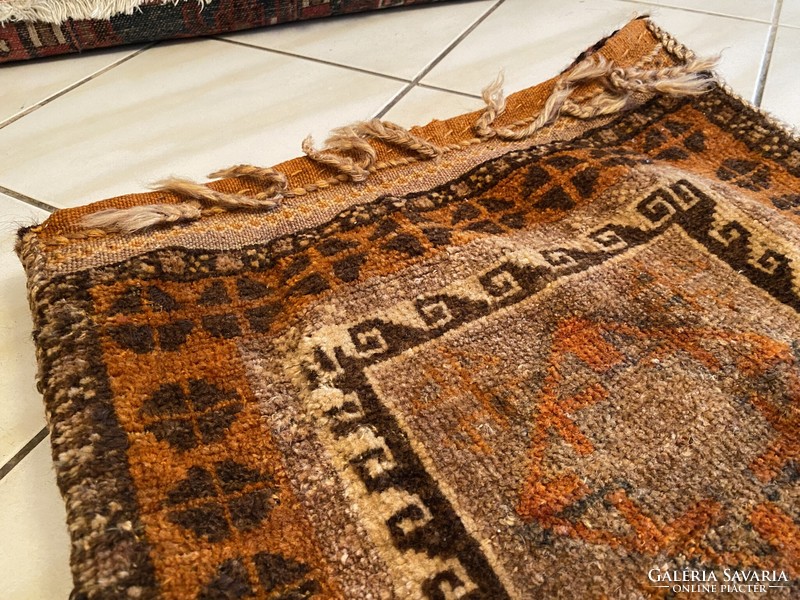 Antique hand-knotted nomadic camel bag