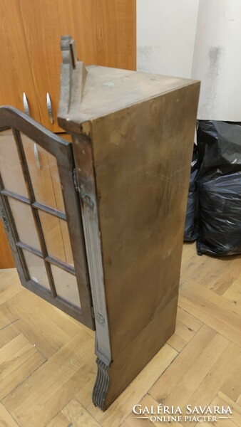 Wooden corner cabinet with glass