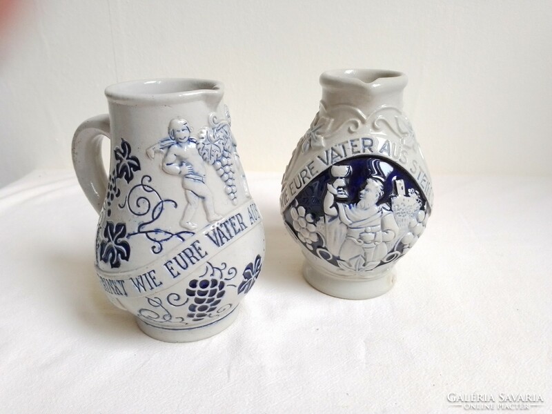 Pair of two old German blue gray stoneware porcelain jugs wine pouring jugs 2.5 dl labeled grapes