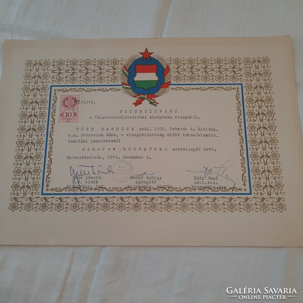 Certificate of successful completion of the social security secondary examination in 1974.