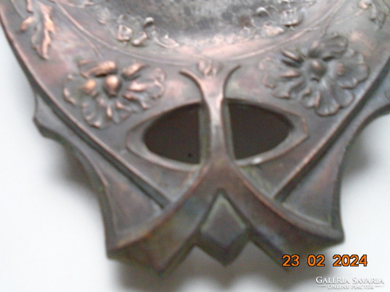 Art Nouveau bronzed hand-made metal wall decoration crumb tray decorated with a repoussé flower motif