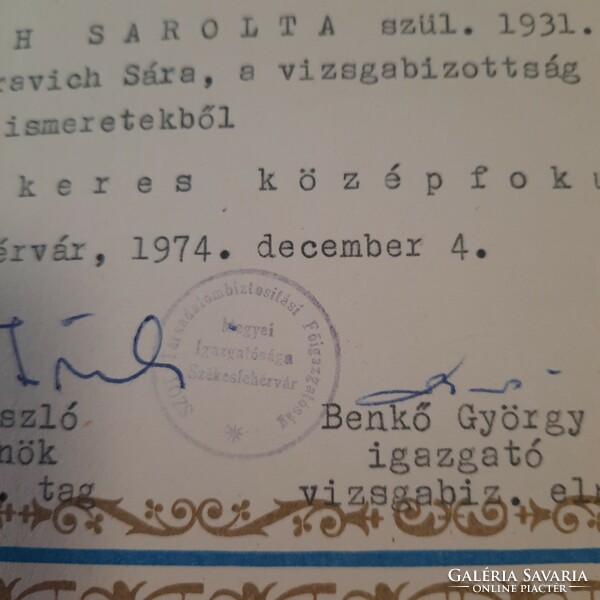 Certificate of successful completion of the social security secondary examination in 1974.