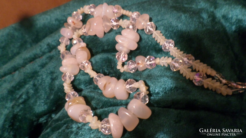 59 cm, slightly pink necklace, made of curls and faceted crystal pearls.