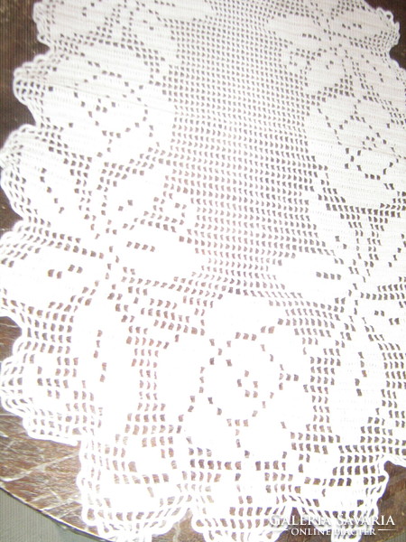 Beautiful antique white hand-crocheted rose oval tablecloth