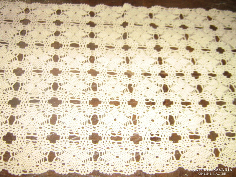 Beautiful beige crocheted antique lace tablecloth