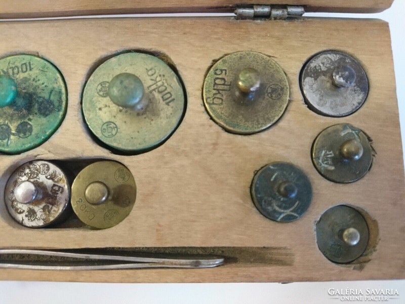 Old antique scale weight set from the 1930s weights from 1 gram to 200 grams