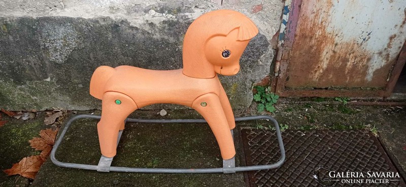 Retro plastic rocking horse