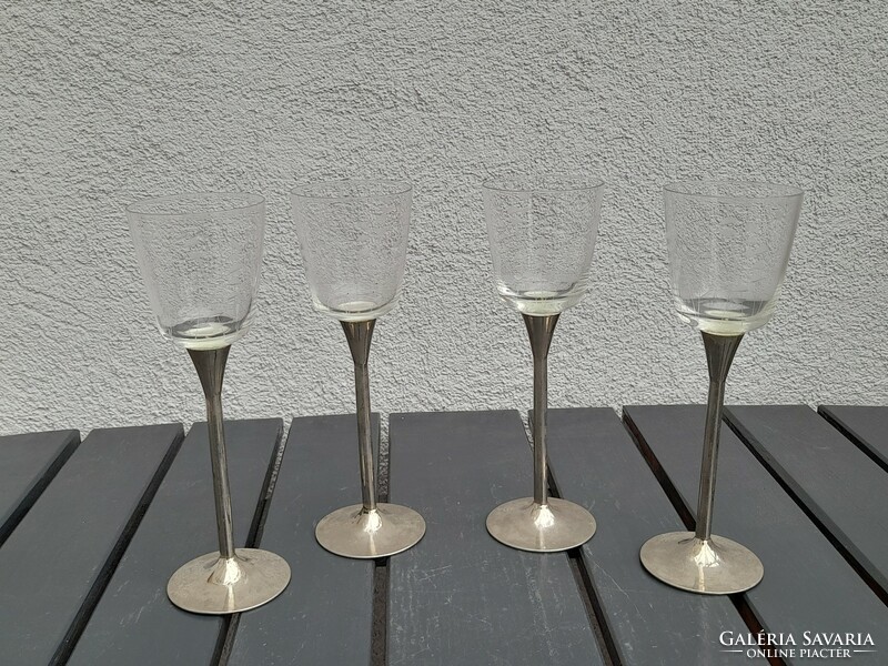 Engraved glasses with metal bases in one