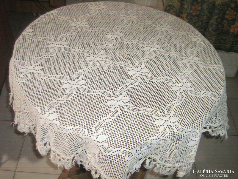 Charming antique fringed lace tablecloth in an oval circle