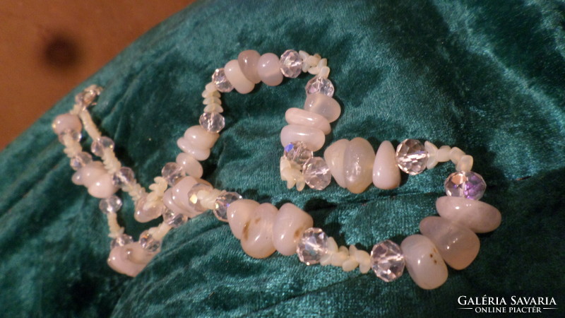 59 cm, slightly pink necklace, made of curls and faceted crystal pearls.