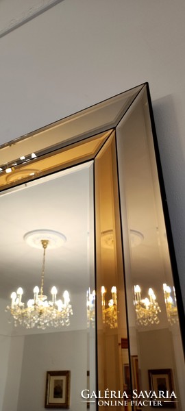 Large, Schöninger brand, faceted, polished mirror, in rose gold/bronze mirror frame