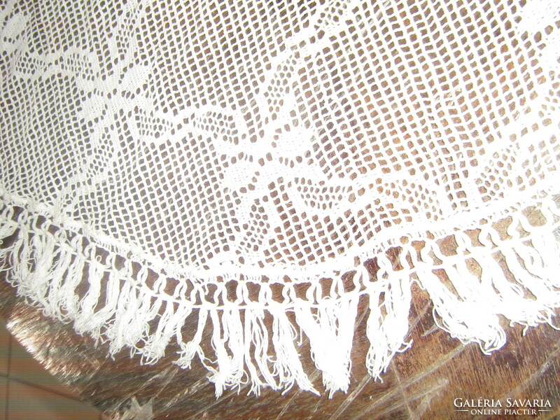Charming antique fringed lace tablecloth in an oval circle