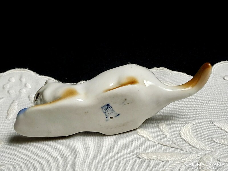 Zsolnay porcelain cat lying down playing with a blue ball 11 cm