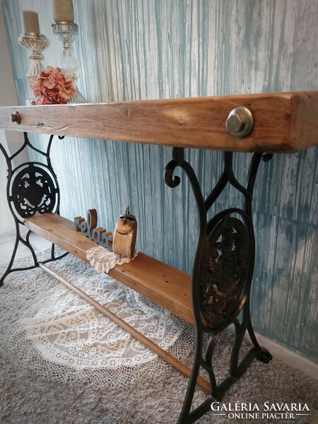 Console table with sewing machine foot, table, singer