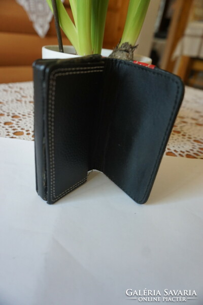Faux leather 12 business card or payment card holder for sale.