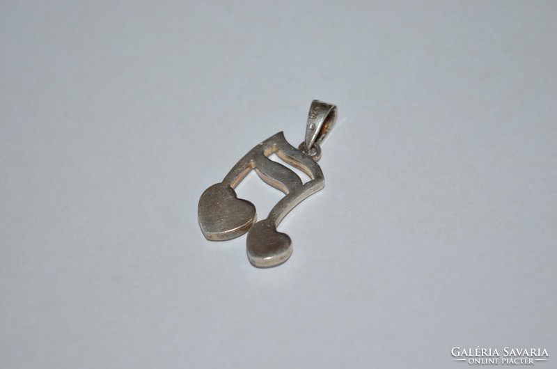 Silver musical note pendant