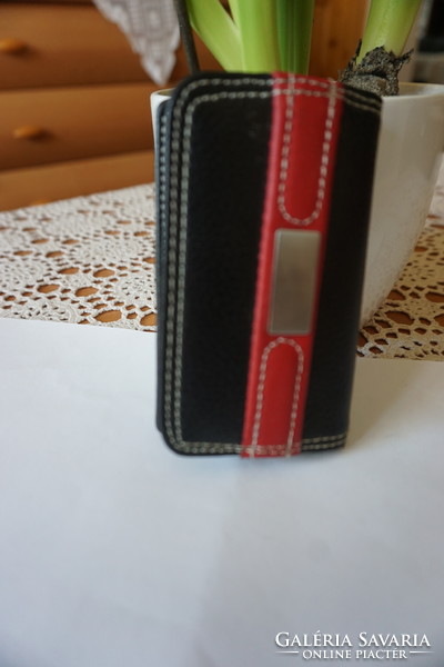 Faux leather 12 business card or payment card holder for sale.
