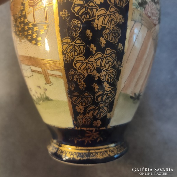 Japanese porcelain vase with geishas