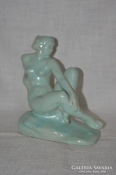 Seated woman with hops base glaze (damaged)