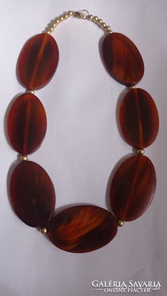 Modern brownish orange horn necklace, elegant, avant-garde women's jewelry