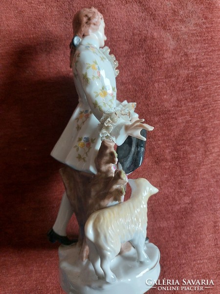Charming French porcelain shepherd boy-shepherd girl pair with lambs