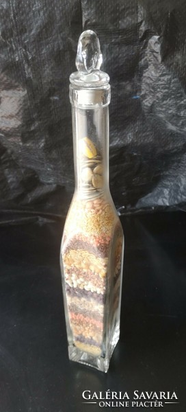 Glass filled with fruits and spices is 37.5 cm high