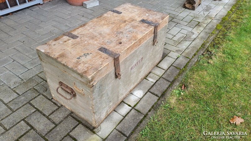 Old military tools in a wooden chest - giant vise, planers, hand drills, chisels, saws, axes, etc.