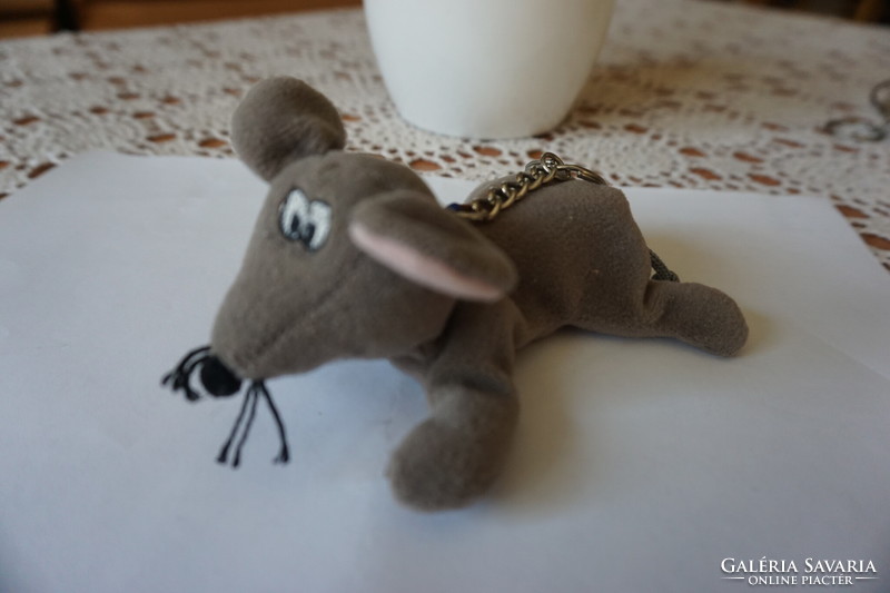 Plush mascot animal with key ring for sale.