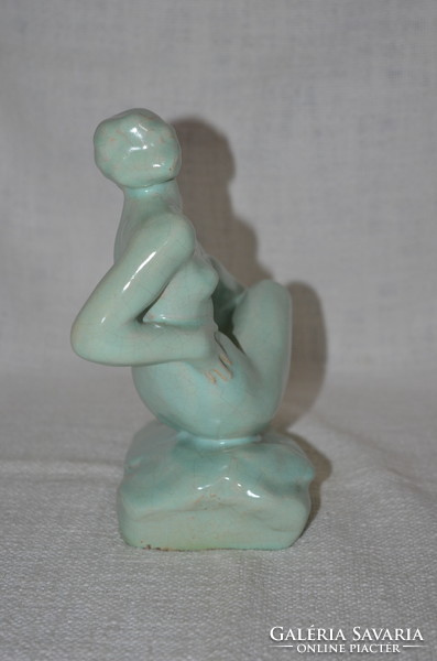 Seated woman with hops base glaze (damaged)