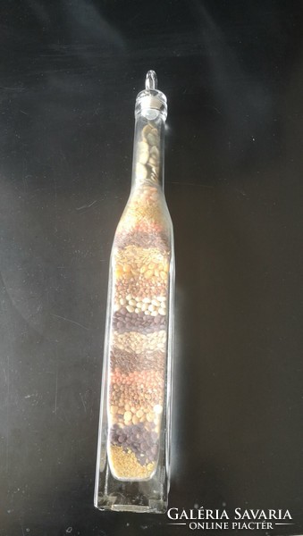 Glass filled with fruits and spices is 37.5 cm high