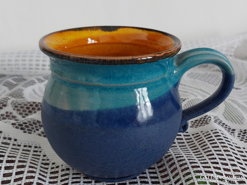 Alternation of retro blue colors, matte and glossy, rough and smooth belly glazed ceramic mug, spout - 1/2 l