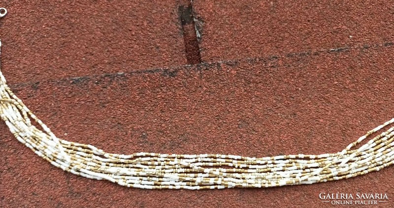 Multi-row pearl necklaces