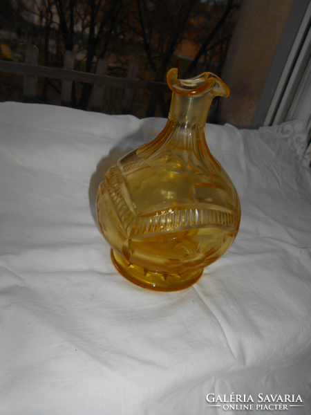 Antique polished yellow glass bottle