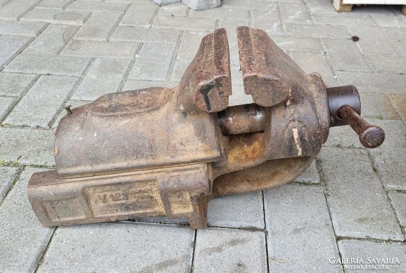 Old military tools in a wooden chest - giant vise, planers, hand drills, chisels, saws, axes, etc.