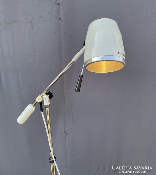 Vintage medical rolling floor lamp.