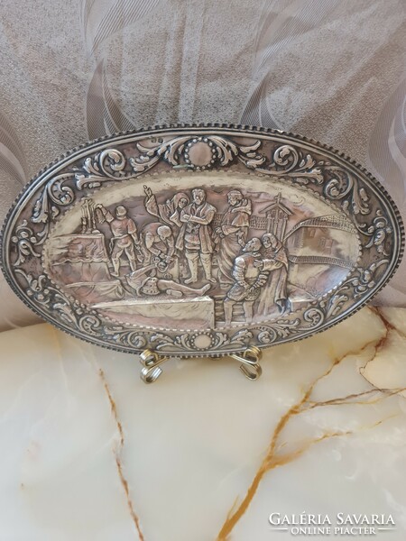 Antique silver rare offering with convex decorations and wavy edge
