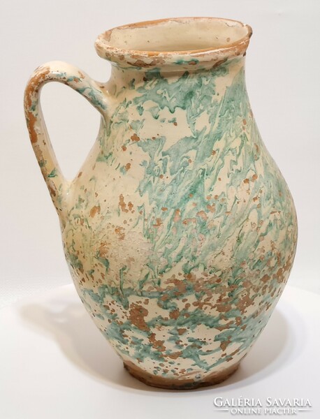 Folk ceramic milk jug with light green glaze spots and white glaze (2965)