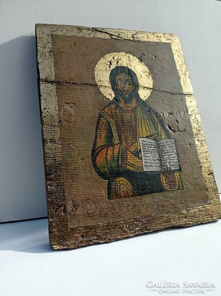 Jesus icon on painted wooden board