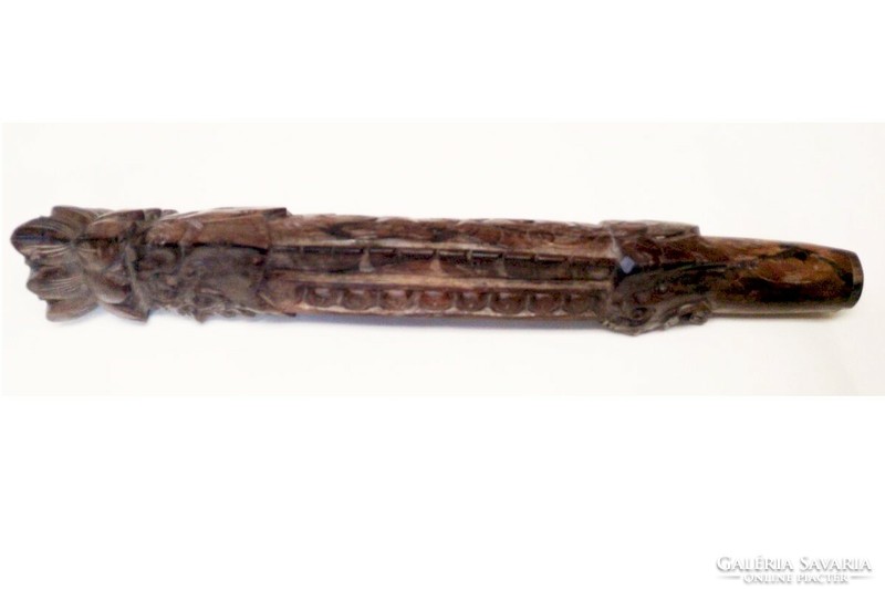 Folk art craft instrument. Suling carved flute from the Malay, Indonesian archipelago