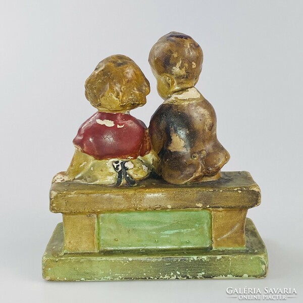 Dr. Rank ceramic pottery - children sitting on a bench