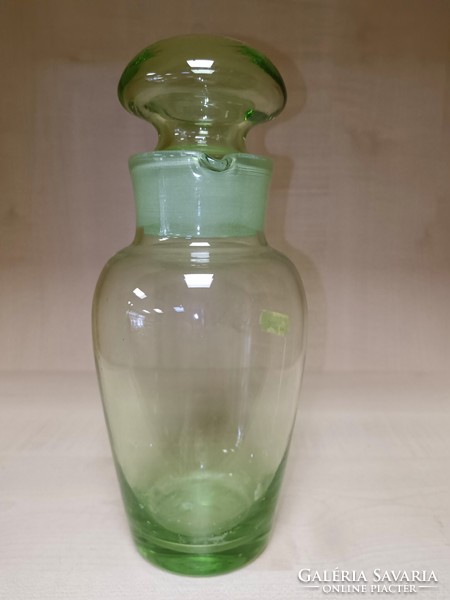 Iridescent green apothecary bottle