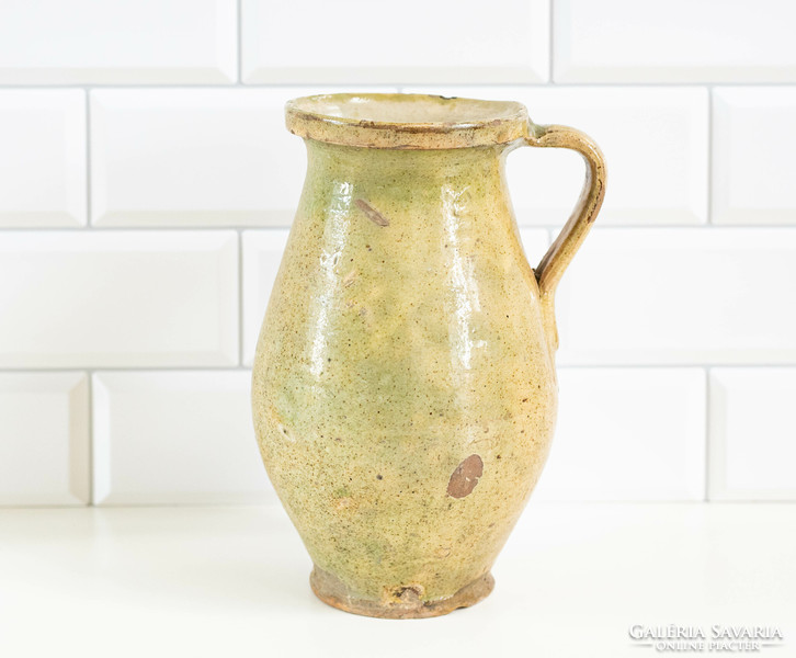 Old ceramic sherd with a greenish-yellow glaze - jug, jug, jug, folk art