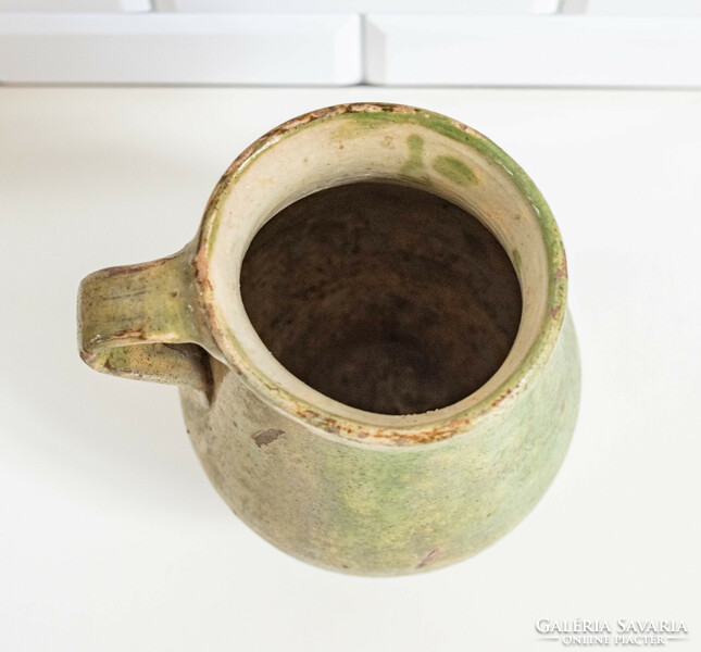 Old ceramic sherd with a greenish-yellow glaze - jug, jug, jug, folk art