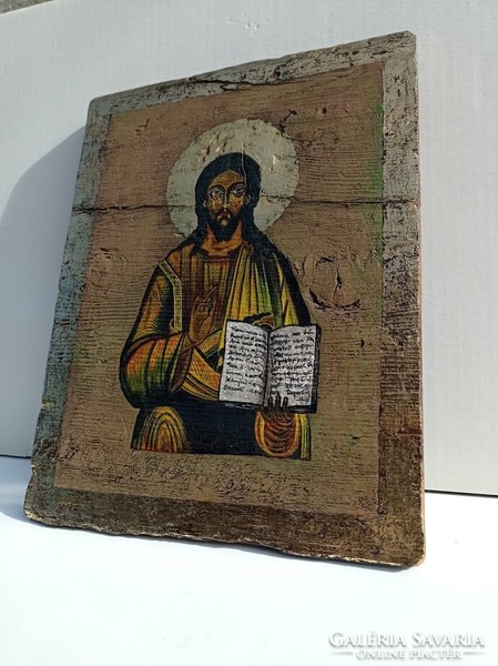 Jesus icon on painted wooden board