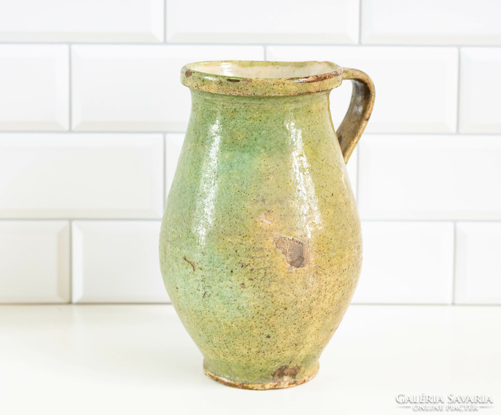 Old ceramic sherd with a greenish-yellow glaze - jug, jug, jug, folk art