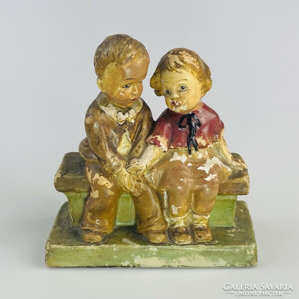 Dr. Rank ceramic pottery - children sitting on a bench