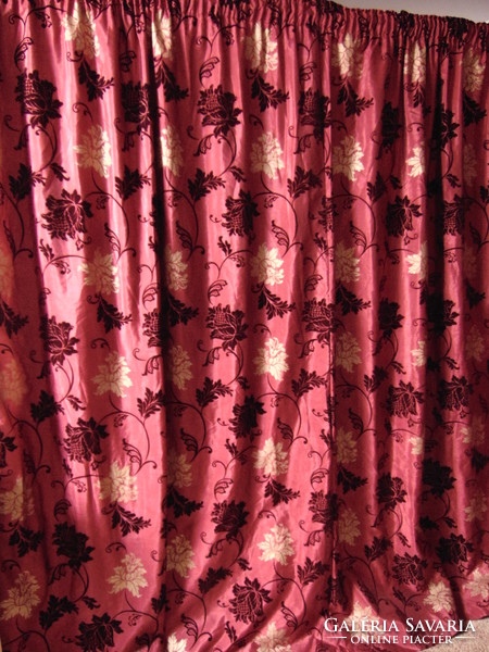 A pair of wonderful burgundy red baroque blackout curtains