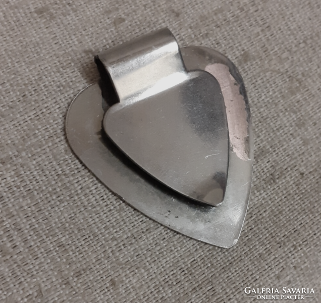 Heart-shaped steel money clip bookmark in good condition